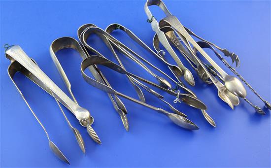 Thirteen pairs of Georgian and later silver sugar tongs, 12.5 oz.